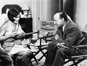 Thirtysomething: Couple sitting together having tea
