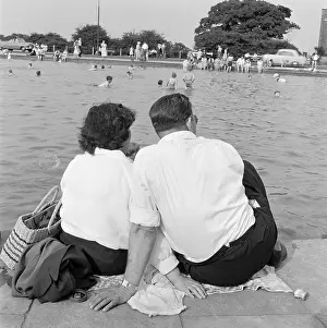 Whitestone: Couple Sitting By Pond