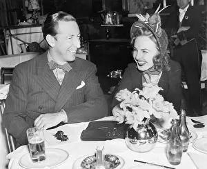 Sustenance: Couple sitting together at a table having fun