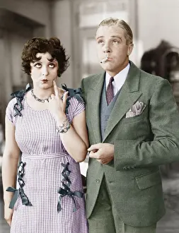 Warranties: Couple standing together looking funny