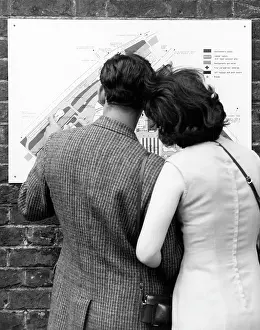 Theyll: COUPLE STUDYING A MAP
