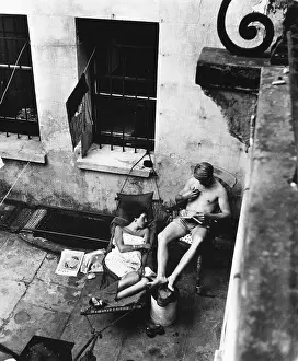 Aspiration: Couple sunbathing, North Kensington