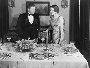 Interactions: Couple with table set for dinner