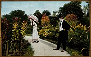 Classy: Couple walking along a garden path