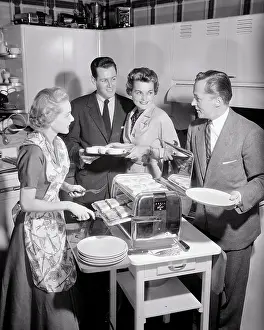 Grilled: Two Couples in Kitchen Preparing Late Night Early
