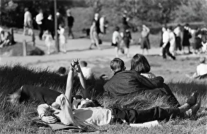 Exuberant: Two couples in a park on a sunny day