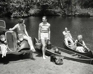 Fender: Two Couples with Picnic and Camping Gear Loading