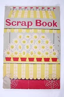 Inserted: Front cover of a scrap book