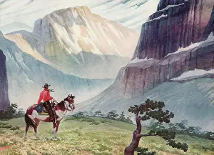Ranchers: Cowboy admiring view of Mountains