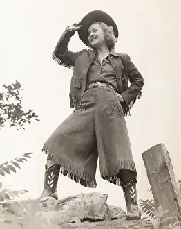 Tipping: Cowgirl tipping her hat