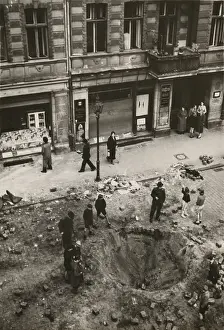 Rs4wnlcgr: Crater made by British bomb dropped into downtown