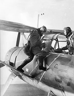 Replaced: The crew of a Hs 126 gets into the engine, 1939