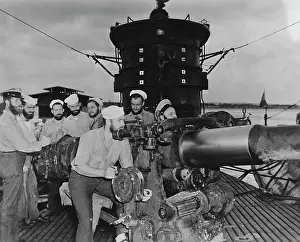 Firepower: Crewmembers aboard USS S-44 manning the submarine's