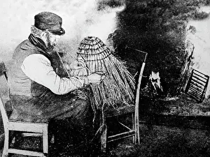 Crofter: Crofter making a peat kishie in the Shetland Isles, Scotland