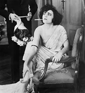 Skeptic: Cross dressed man receiving message and flowers