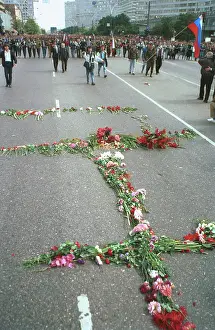 Ilya: Cross of flowers at the site where three Muscovites