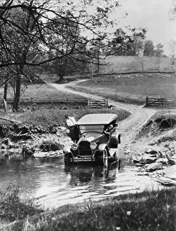 Wants: Crossing a stream in the car, 1928