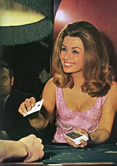 Croupier: Croupier dealing cards