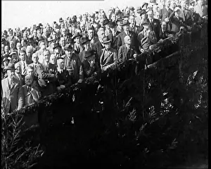 Raked: A Crowd of German Men on Standing on a Raked