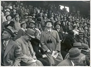 Expectantly: Crowd at a Horse Race