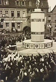 Conformity: Crowd in Ottweiler, Germany, saluting an unidentified