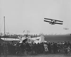 Manouvers: A Crowd of People Watching a Alan Cobham's Flying Circus?