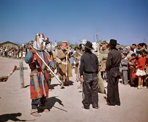 Del001: Crowd of People Watching Native American Yaqui