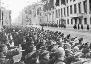 Anthem: Crowd performing the Hitler salute in the Wilhelmstrasse in