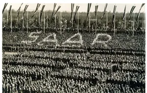 Objectives: Crowd scene forming the word SAAR, Nuremburg