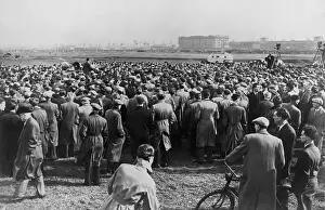 Loudspeakers: Crowd of striking ship repair workers listening ?