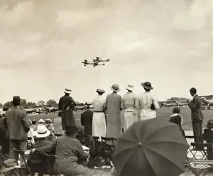 Manouvers: A Crowd Watching a Formation of Royal Airforce Hawker Ha?