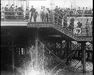 Splashes: A Crowd Watching as a Man Splashes Into the