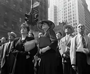 Spectator: A crowd watching the news line on the Times