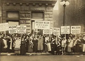 Withheld: Crowd of women's suffrage supporters demonstrating ?