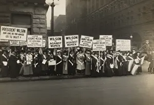 Withheld: Crowd of women's suffrage supporters demonstrating ?