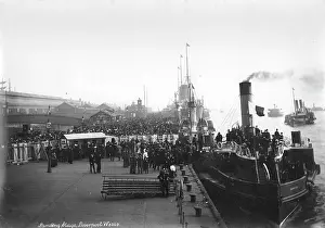 Pierhead: A crowded view of the landing stage with people