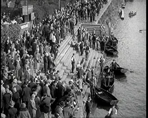 Strolling: Crowds of People Strolling and Rowing on the
