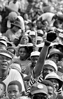Amandla: Crowds seated on the ground at an ANC (African