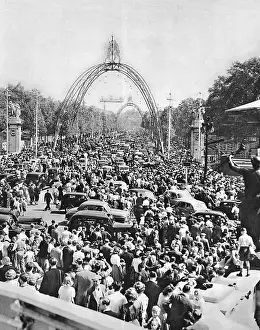 Crowds viewing decorated Mall prior to Coronation, 1953