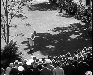 Teeing: Crowds Watching a Golfer Teeing Off
