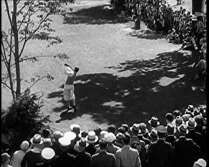 Teeing: Crowds Watching a Golfer Teeing Off