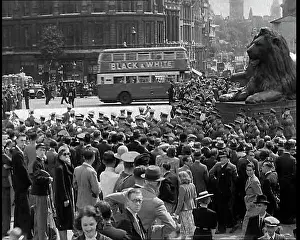 Crowds Watching a Marching Band March in Trafalgar