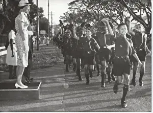 Dignitaries: Cub scouts running past VIPs, British Guyana, South America