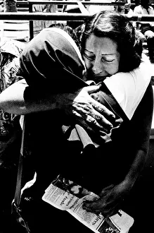 Hugs: Cuban Refugee hugs a nun