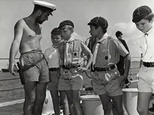 Aden: Cubs learning about the Royal Navy