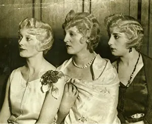 Waved: Curled hair in typical coiffures of 1930