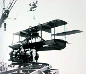 Usmc: Curtiss AB-3 of the USMC being hoisted aboard USS North