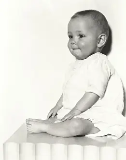Chubby: Cute baby boy sitting on table