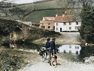 Doone: CYCLISTS REST AT BRIDGE