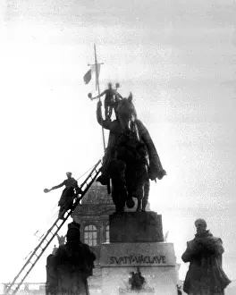 Namesti: Czechoslovak flag is being raised on the statue